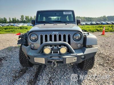 Piąte zdjęcie samochodu w środku: 2016 JEEP WRANGLER UNLIMITED SAHARA VIN:1C4BJWEG9GL174947 - miniatura