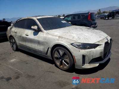Czwarte zdjęcie samochodu z boku: 2024 BMW I4 EDRIVE 35 VIN:WBY43AW09RFR86921 - miniatura