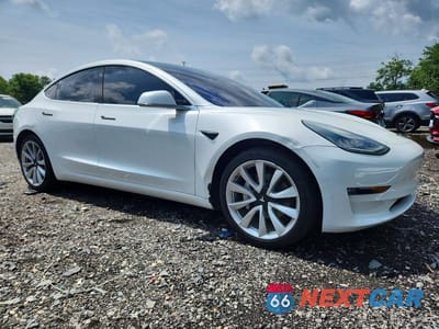 Czwarte zdjęcie samochodu z boku: 2019 TESLA MODEL 3 VIN:5YJ3E1EA9KF311713 - miniatura
