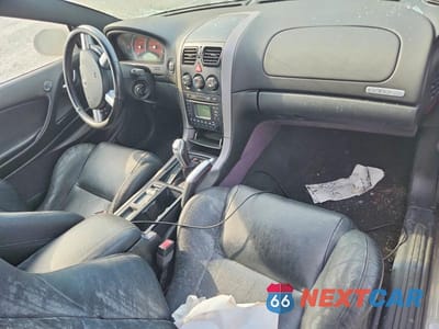 Zdjęcie 8 z 12 samochodu: 2004 PONTIAC GTO VIN:6G2VX12GX4L189320 - miniatura
