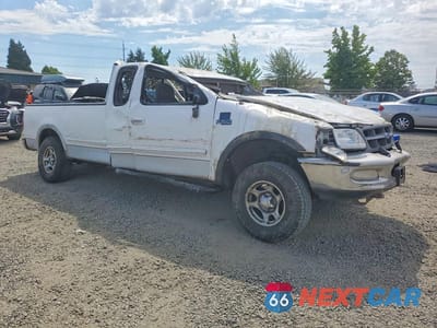 Czwarte zdjęcie samochodu z boku: 1997 FORD F150 VIN:1FTDX18W7VKB92556 - miniatura