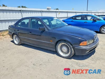 Czwarte zdjęcie samochodu z boku: 2000 BMW 528 I AUTOMATIC VIN:WBADM6345YGV01618 - miniatura