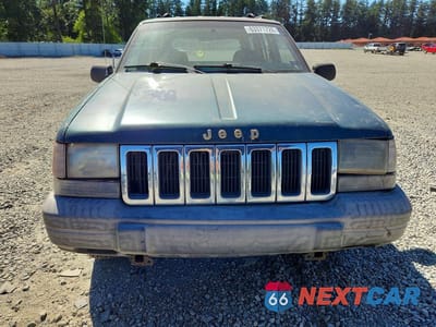 Piąte zdjęcie samochodu w środku: 1997 JEEP GRAND CHEROKEE LAREDO VIN:1J4GZ58S6VC727280 - miniatura
