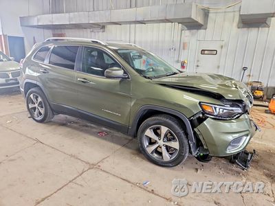 Czwarte zdjęcie samochodu z boku: 2019 JEEP CHEROKEE LIMITED VIN:1C4PJMDX1KD166257 - miniatura