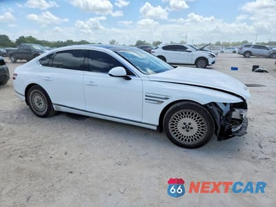 Czwarte zdjęcie samochodu z boku: 2022 GENESIS G80 2.5T VIN:KMTGB4SC5NU109594 - miniatura