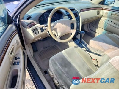 Zdjęcie 8 z 12 samochodu: 2000 TOYOTA CAMRY SOLARA SE VIN:2T1CG22P3YC276740 - miniatura