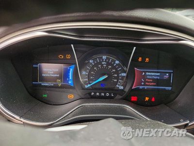 Zdjęcie 9 z 13 samochodu: 2013 FORD FUSION SE HYBRID VIN:3FA6P0LU9DR300054 - miniatura