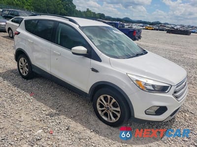 Czwarte zdjęcie samochodu z boku: 2018 FORD ESCAPE SE VIN:1FMCU9GD1JUC20378 - miniatura