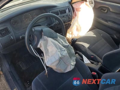 Zdjęcie 8 z 12 samochodu: 1994 TOYOTA COROLLA DX VIN:1NXAE09B0RZ209895 - miniatura