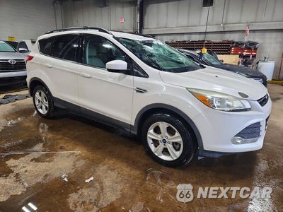Czwarte zdjęcie samochodu z boku: 2016 FORD ESCAPE SE VIN:1FMCU9GX4GUB10301 - miniatura