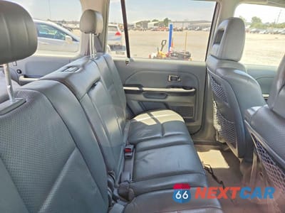 Zdjęcie 11 z 13 samochodu: 2005 HONDA PILOT EXL VIN:5FNYF18585B039385 - miniatura