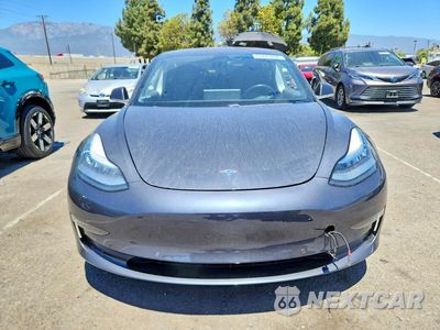 Piąte zdjęcie samochodu w środku: 2018 TESLA MODEL 3 VIN:5YJ3E1EA9JF077622 - miniatura