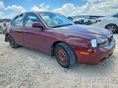 Czwarte zdjęcie samochodu z boku: 2001 HYUNDAI ELANTRA GLS VIN:KMHDN45D61U207925 - miniatura