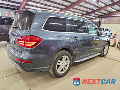 Trzecie zdjęcie samochodu z tyłu: 2013 MERCEDES-BENZ GL 450 4MATIC VIN:4JGDF7CE9DA141287 - miniatura