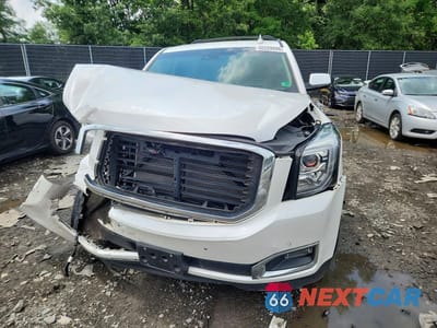 Piąte zdjęcie samochodu w środku: 2017 GMC YUKON XL DENALI VIN:1GKS2HKJ8HR307189 - miniatura