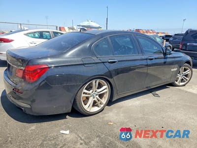 Trzecie zdjęcie samochodu z tyłu: 2013 BMW 750 I VIN:WBAYA8C59DC996616 - miniatura