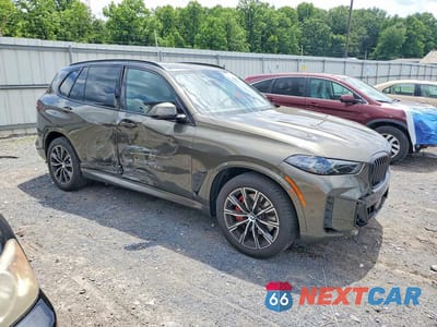 Czwarte zdjęcie samochodu z boku: 2026 BMW X5 XDRIVE40I VIN:5UX23EU09T9417736 - miniatura