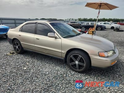 Czwarte zdjęcie samochodu z boku: 1995 HONDA ACCORD EX VIN:JHMCD5657SC036799 - miniatura