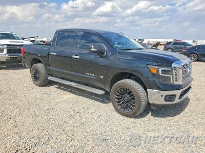 Czwarte zdjęcie samochodu z boku: 2019 NISSAN TITAN SV VIN:1N6AA1E5XKN507163 - miniatura