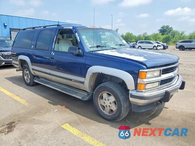 Czwarte zdjęcie samochodu z boku: 1994 CHEVROLET SUBURBAN K1500 VIN:1GNFK16K7RJ420372 - miniatura