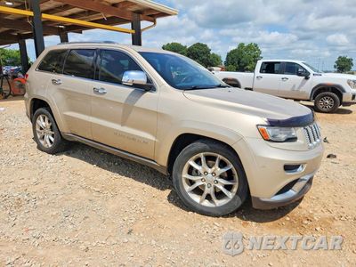 Czwarte zdjęcie samochodu z boku: 2014 JEEP GRAND CHEROKEE SUMMIT VIN:1C4RJEJT2EC359592 - miniatura