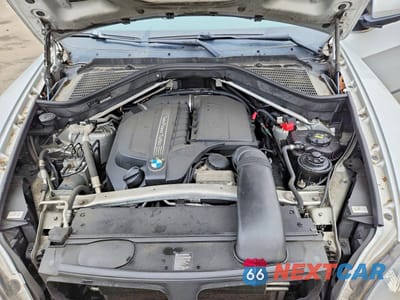 Zdjęcie 12 z 13 samochodu: 2013 BMW X5 XDRIVE35I VIN:5UXZV4C52D0E08742 - miniatura