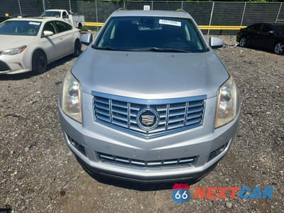 Piąte zdjęcie samochodu w środku: 2014 CADILLAC SRX PREMIUM COLLECTION VIN:3GYFNDE39ES596306 - miniatura