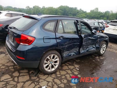Trzecie zdjęcie samochodu z tyłu: 2013 BMW X1 XDRIVE28I VIN:WBAVL1C54DVR92482 - miniatura