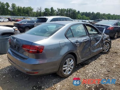 Trzecie zdjęcie samochodu z tyłu: 2018 VOLKSWAGEN JETTA S VIN:3VW2B7AJXJM220714 - miniatura