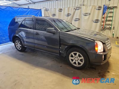 Czwarte zdjęcie samochodu z boku: 2009 CADILLAC SRX VIN:1GYEE637990111480 - miniatura