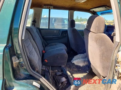 Zdjęcie 11 z 13 samochodu: 1997 JEEP GRAND CHEROKEE LAREDO VIN:1J4GZ58S6VC727280 - miniatura