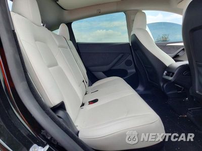 Zdjęcie 10 z 13 samochodu: 2024 TESLA MODEL Y VIN:7SAYGDED5RF088143 - miniatura
