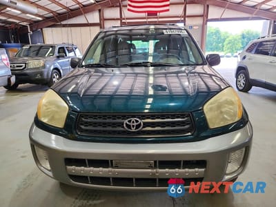 Piąte zdjęcie samochodu w środku: 2003 TOYOTA RAV4 BASE VIN:JTEHH20V630241466 - miniatura