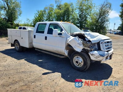Czwarte zdjęcie samochodu z boku: 2002 FORD F350 SUPER DUTY VIN:1FDWW37F82ED28482 - miniatura