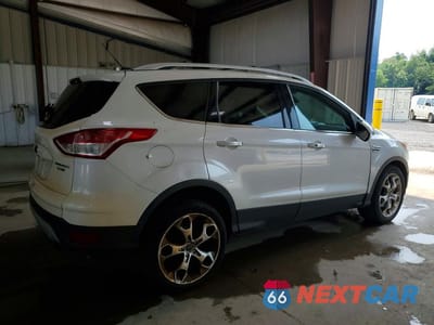 Trzecie zdjęcie samochodu z tyłu: 2013 FORD ESCAPE TITANIUM VIN:1FMCU9J98DUA02575 - miniatura