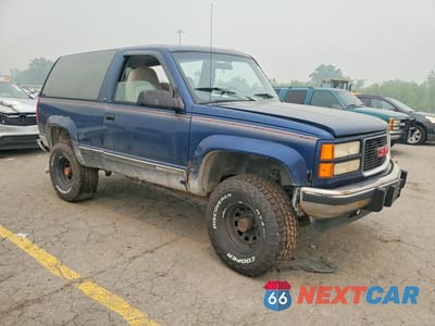 Czwarte zdjęcie samochodu z boku: 1994 GMC YUKON VIN:1GKEK18K9RJ743943 - miniatura