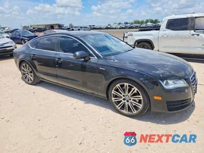 Czwarte zdjęcie samochodu z boku: 2014 AUDI A7 PREMIUM PLUS VIN:WAUWGAFC2EN093012 - miniatura