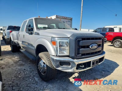 Czwarte zdjęcie samochodu z boku: 2013 FORD F350 SUPER DUTY VIN:1FT8W3DT3DEA09422 - miniatura