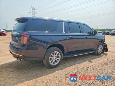 Trzecie zdjęcie samochodu z tyłu: 2023 CHEVROLET SUBURBAN K1500 PREMIER VIN:1GNSKFKD3PR379434 - miniatura