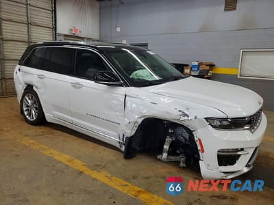 Czwarte zdjęcie samochodu z boku: 2022 JEEP GRAND CHEROKEE SUMMIT 4XE VIN:1C4RJYE61N8755991 - miniatura