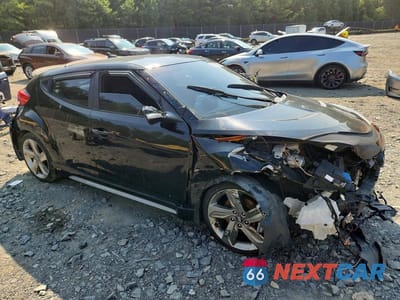 Czwarte zdjęcie samochodu z boku: 2015 HYUNDAI VELOSTER TURBO VIN:KMHTC6AE5FU225688 - miniatura