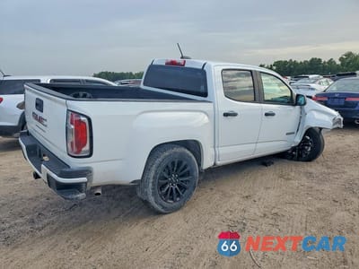 Trzecie zdjęcie samochodu z tyłu: 2021 GMC CANYON ELEVATION VIN:1GTG5BEA1M1140409 - miniatura