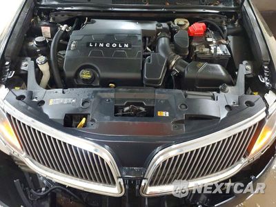 Zdjęcie 11 z 12 samochodu: 2014 LINCOLN MKS VIN:1LNHL9EK1EG602361 - miniatura