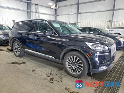 Czwarte zdjęcie samochodu z boku: 2020 LINCOLN AVIATOR RESERVE VIN:5LM5J7XC8LGL14351 - miniatura