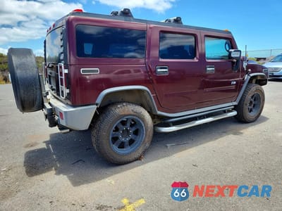 Trzecie zdjęcie samochodu z tyłu: 2006 HUMMER H2 VIN:5GRGN23U86H105260 - miniatura