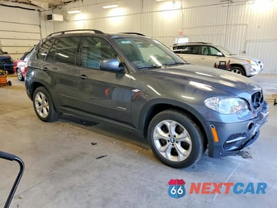 Czwarte zdjęcie samochodu z boku: 2012 BMW X5 XDRIVE50I VIN:5UXZV8C50CL425072 - miniatura