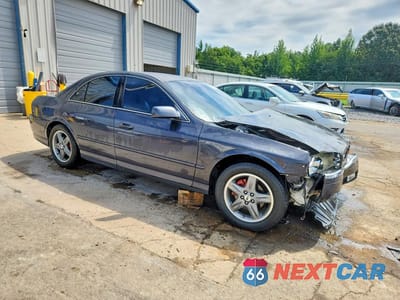 Czwarte zdjęcie samochodu z boku: 2002 LINCOLN LS VIN:1LNHM87A12Y607514 - miniatura