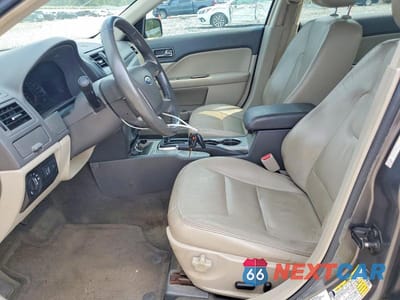 Zdjęcie 7 z 12 samochodu: 2010 FORD FUSION HYBRID VIN:3FADP0L37AR426990 - miniatura