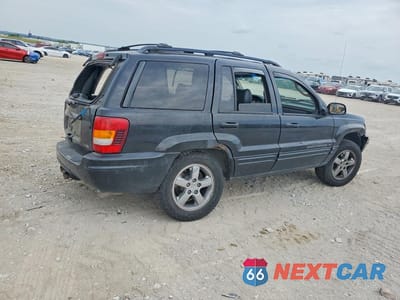 Trzecie zdjęcie samochodu z tyłu: 2003 JEEP GRAND CHEROKEE LIMITED VIN:1J4GW58N83C546746 - miniatura