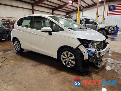 Czwarte zdjęcie samochodu z boku: 2020 HONDA FIT LX VIN:3HGGK5H48LM712806 - miniatura